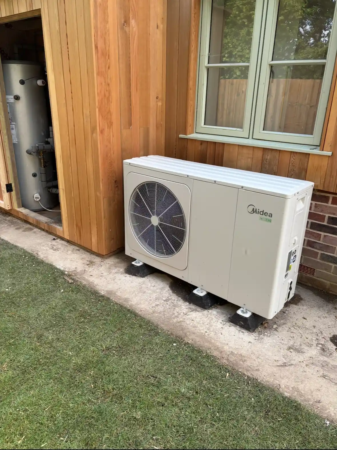 Air-source heat pump installed outside a home